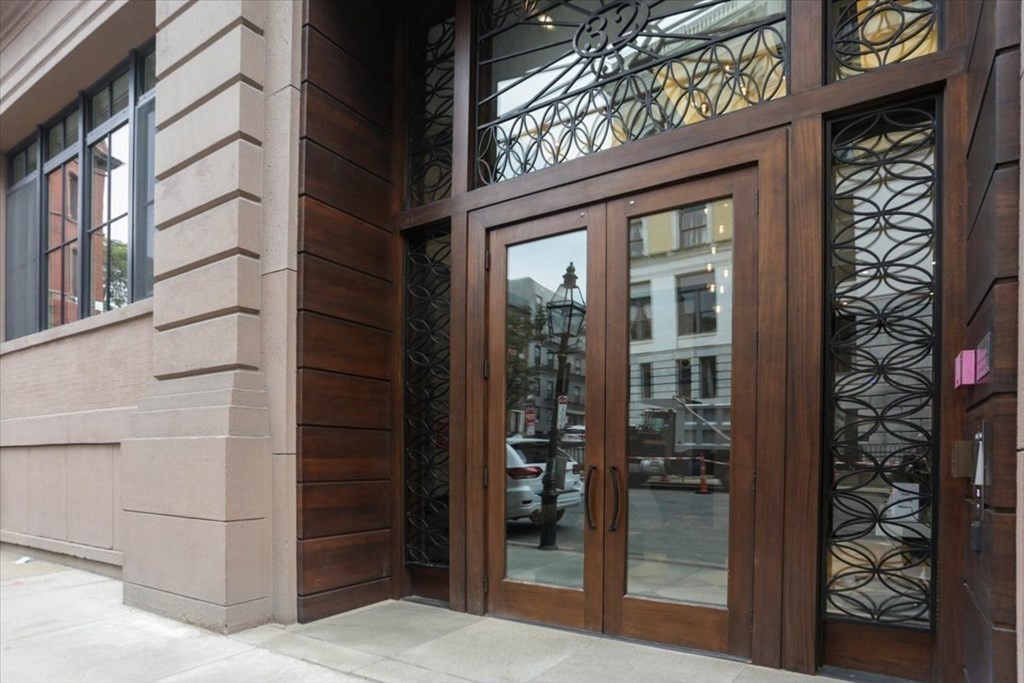 32 Derne Street, Unit 3A Boston, MA 02114 - Photo 3 of 25 a view of a brick building