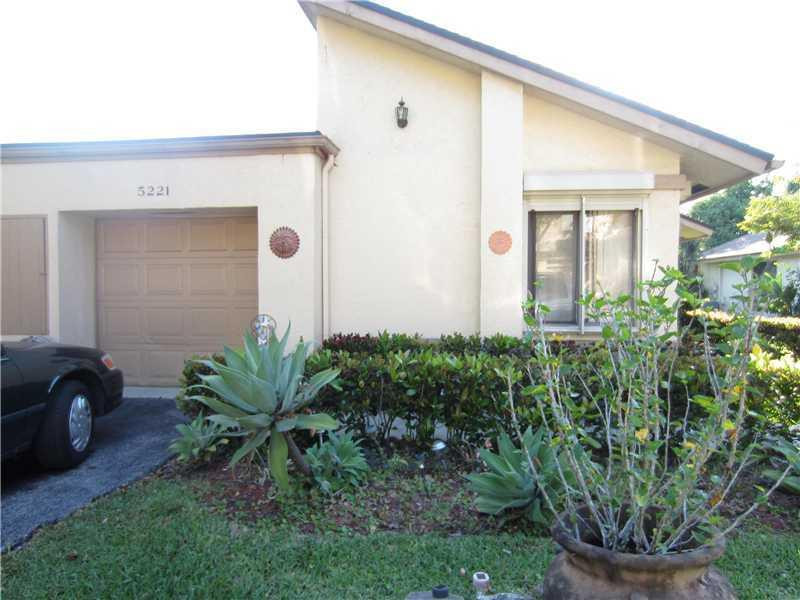 5221 Gate Lake Road, Unit 5221 Tamarac, FL 33319 - Photo 1 of 10 Exterior Front