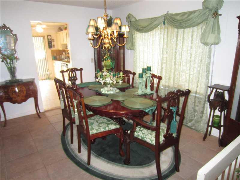 5221 Gate Lake Road, Unit 5221 Tamarac, FL 33319 - Photo 3 of 10 Exterior Front