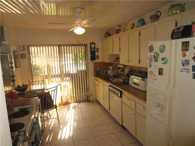 5221 Gate Lake Road, Unit 5221 Tamarac, FL 33319 - Photo 4 of 10 Exterior Front
