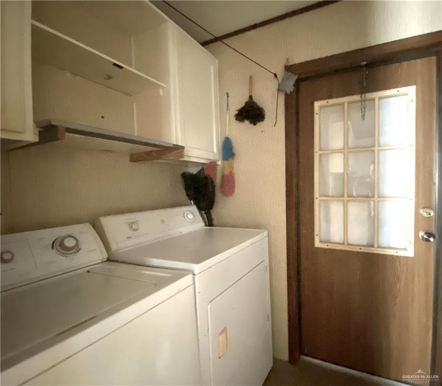 219 Bundle Wagon Drive Mission, TX 78574 - Photo 13 of 30 Laundry area with cabinet space and washer and clothes dryer