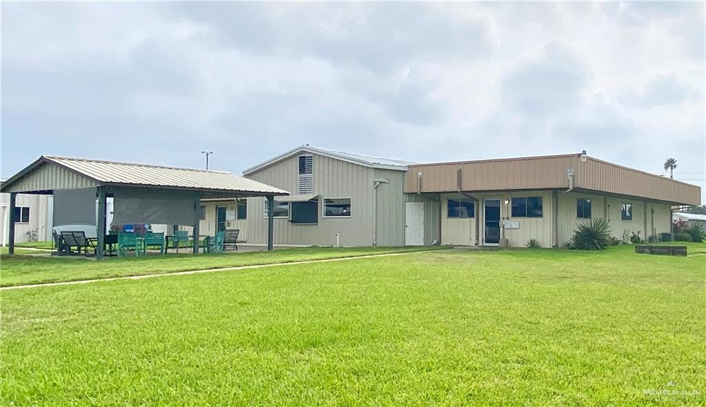 219 Bundle Wagon Drive Mission, TX 78574 - Photo 23 of 30 Rear view of property featuring a yard