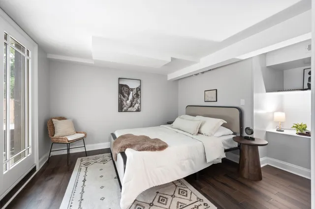 a view of a hallway with bathroom