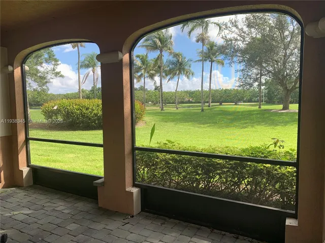 a view of a large window with an outdoor space