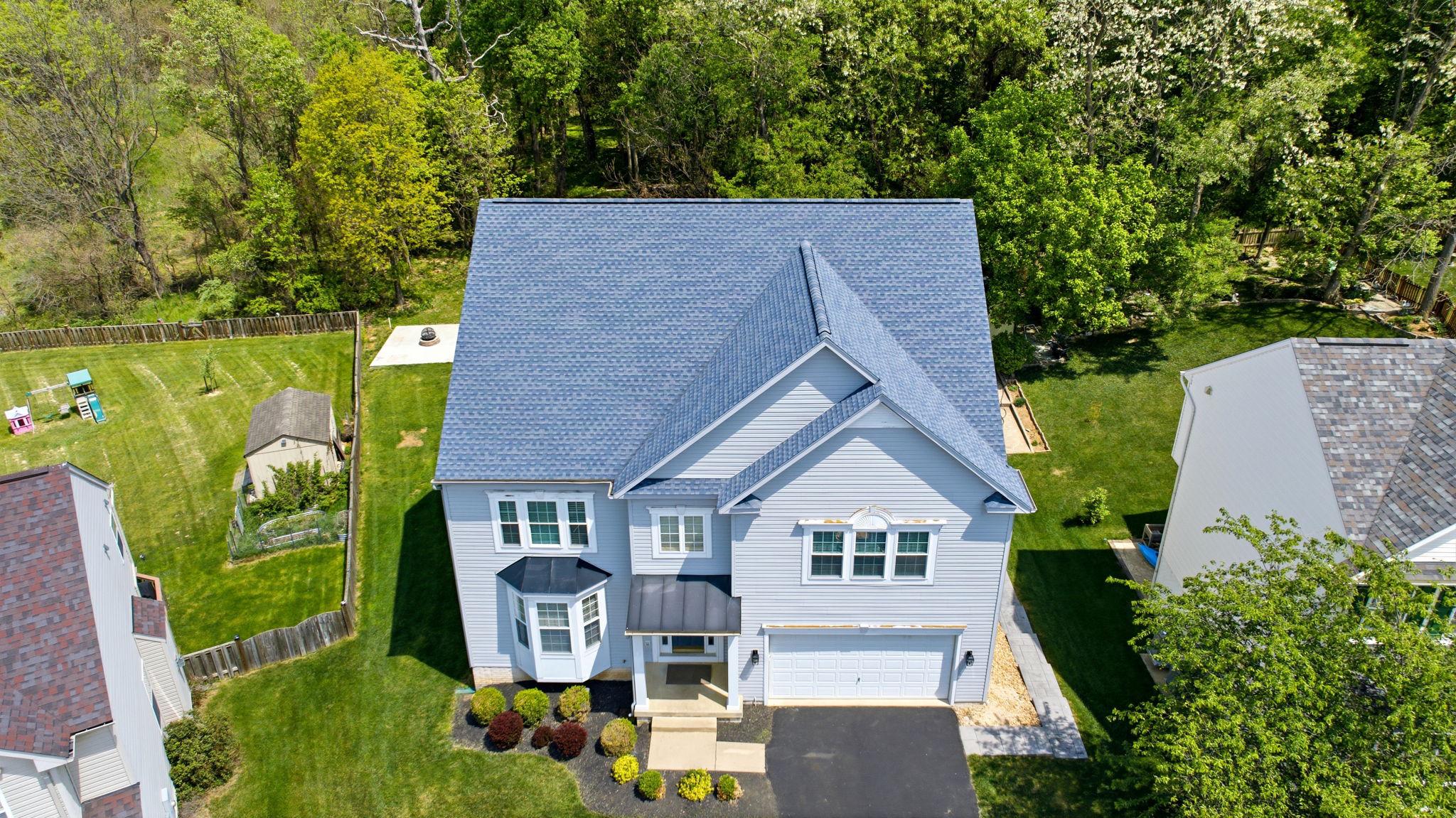 457 Hughs Road Charles Town, WV 25414 - Photo 4 of 73 Charming home nestled in lush greenery.