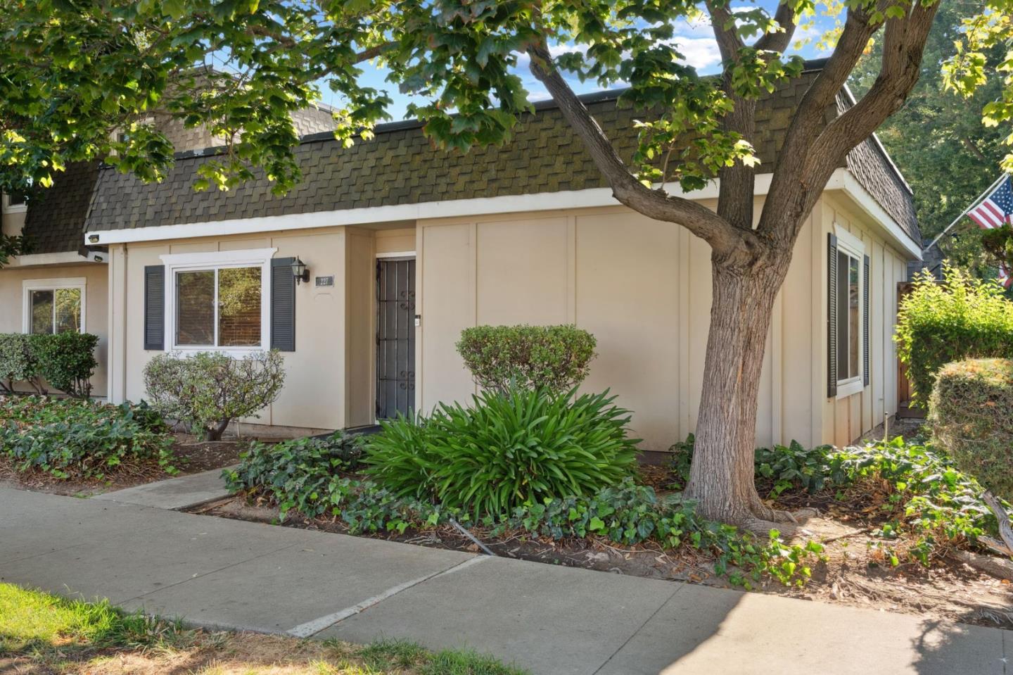 227 Incline Way San Jose, CA 95139 - Photo 1 of 1 a front view of a house with garden