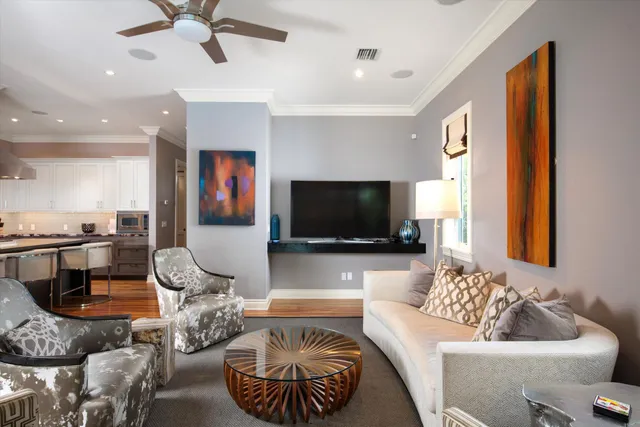 a view of a patio with couple of chairs and a table