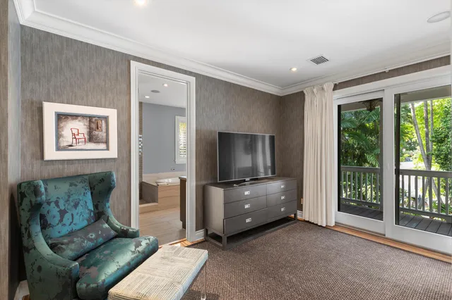 a bathroom with a sink a mirror and a toilet