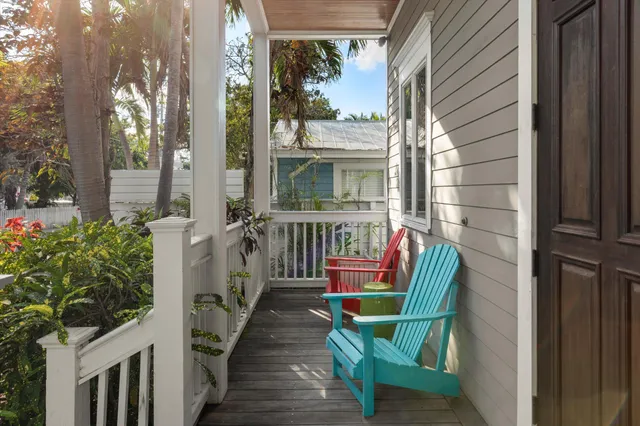 a lobby with furniture and window