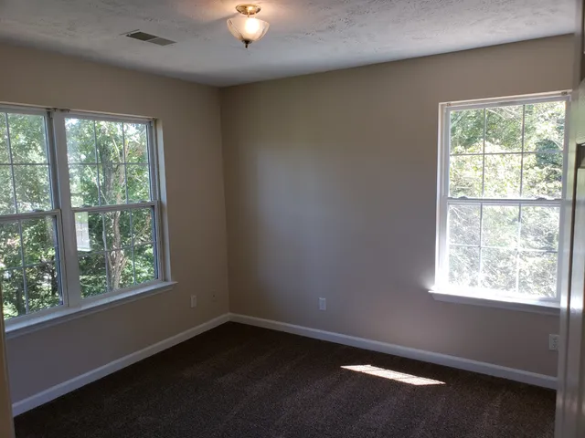 an empty room with a window