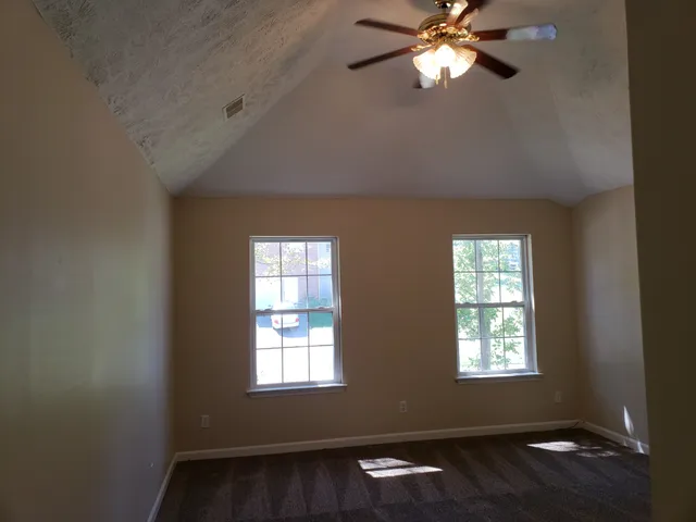 a view of a livingroom with a window