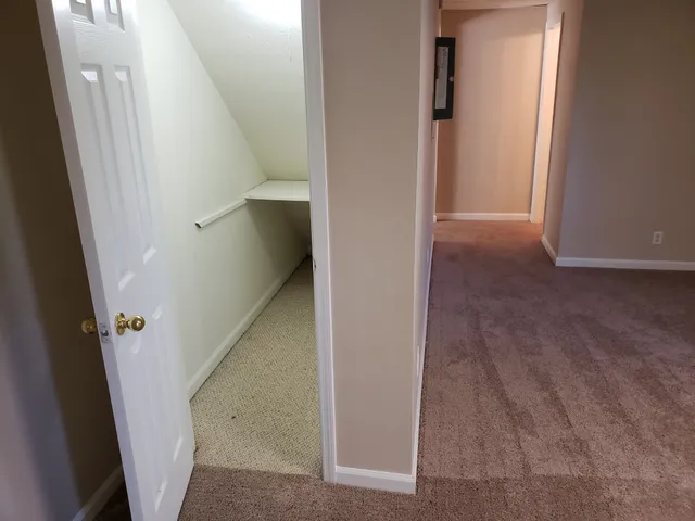 a view of hallway with stairs