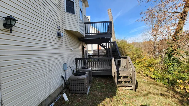 a view of a balcony with chairs