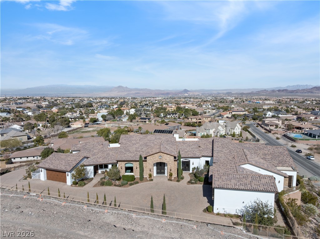 1123 Christian Road Henderson, NV 89002 - Photo 83 of 94 Grand estate with a terracotta roof offers sweeping desert and city views.