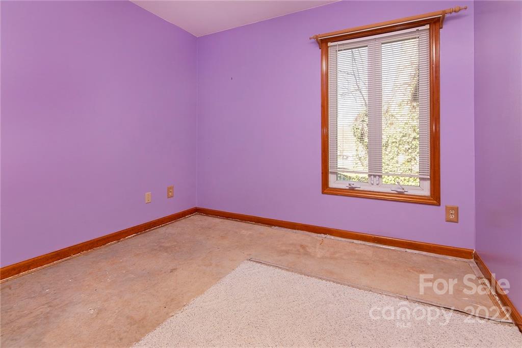 11902 5 Cedars Road Charlotte, NC 28226 - Photo 19 of 24 a view of a small space with a window