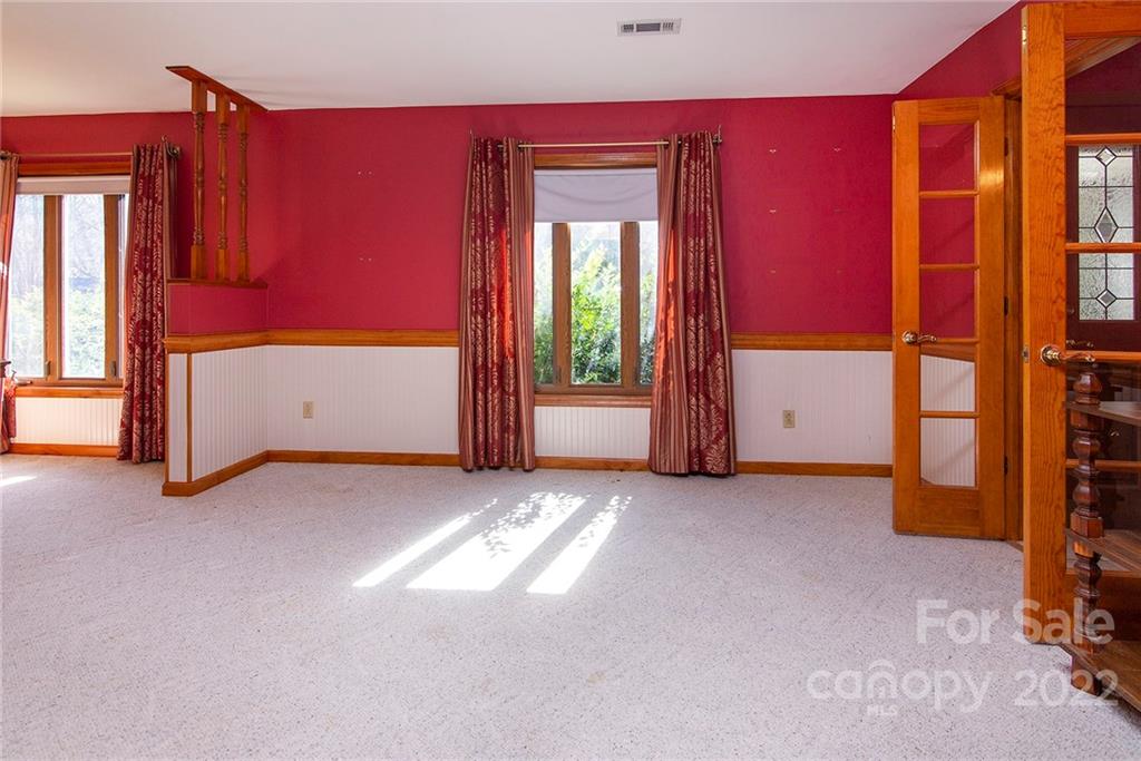 11902 5 Cedars Road Charlotte, NC 28226 - Photo 6 of 24 a view of empty room with a fireplace