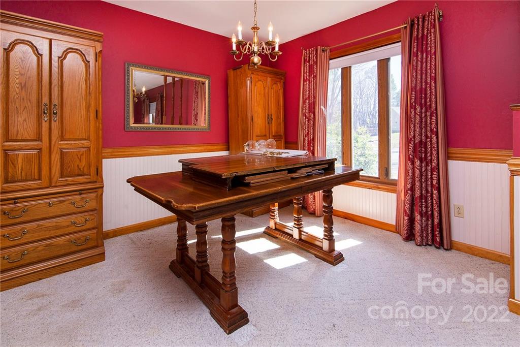 11902 5 Cedars Road Charlotte, NC 28226 - Photo 8 of 24 a view of a livingroom with furniture and window
