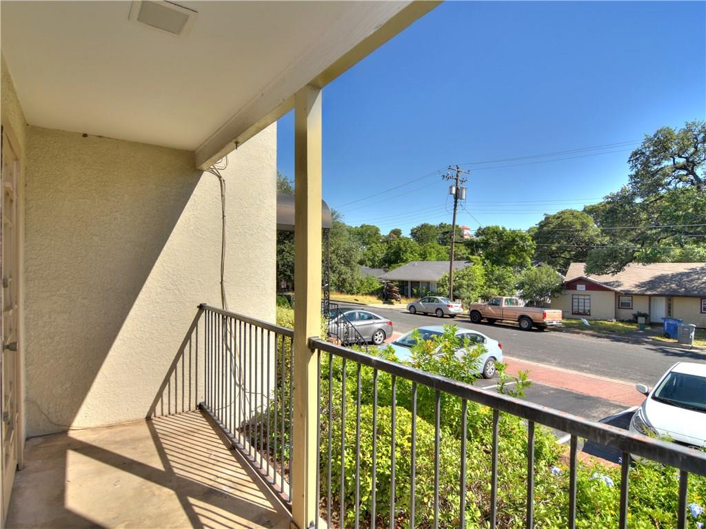 910 Duncan Lane, Unit 2 Austin, TX 78705 - Photo 5 of 11 An inviting covered patio offers a refreshing outdoor retreat with views of the neighborhood.