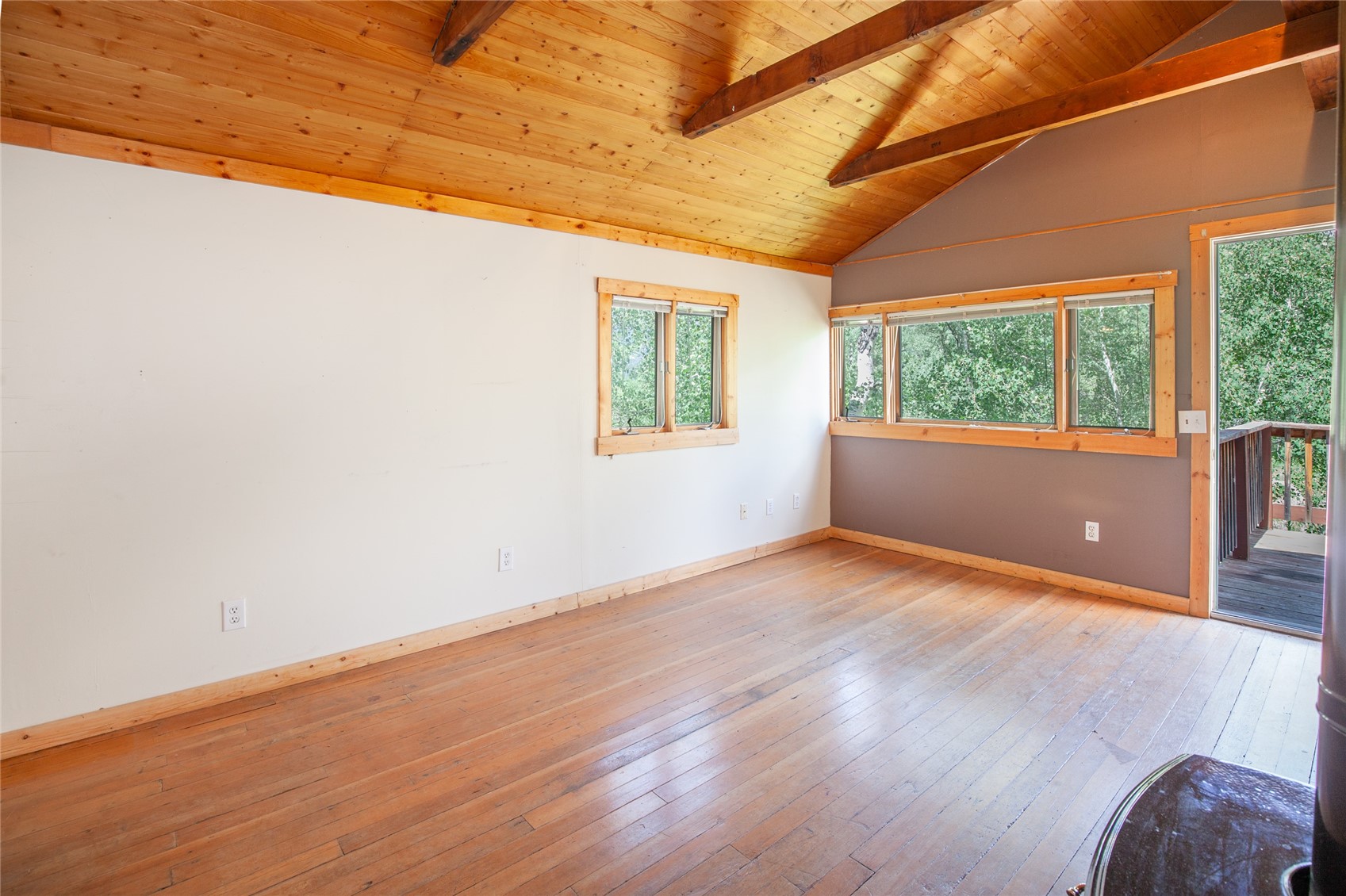 498 D Road Silverthorne, CO 80498 - Photo 23 of 49 Living room with light wood-type flooring, wooden ceiling, and lofted ceiling with beams