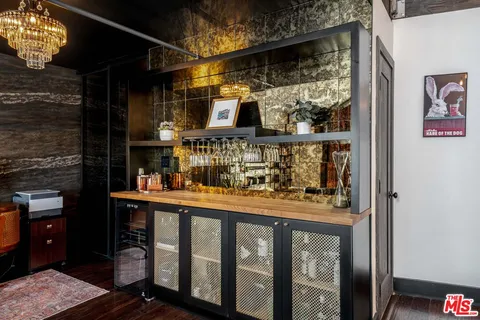 a view of a glass door with a hallway