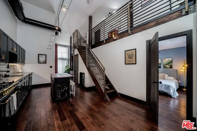 a view of an entryway and livingroom with furniture