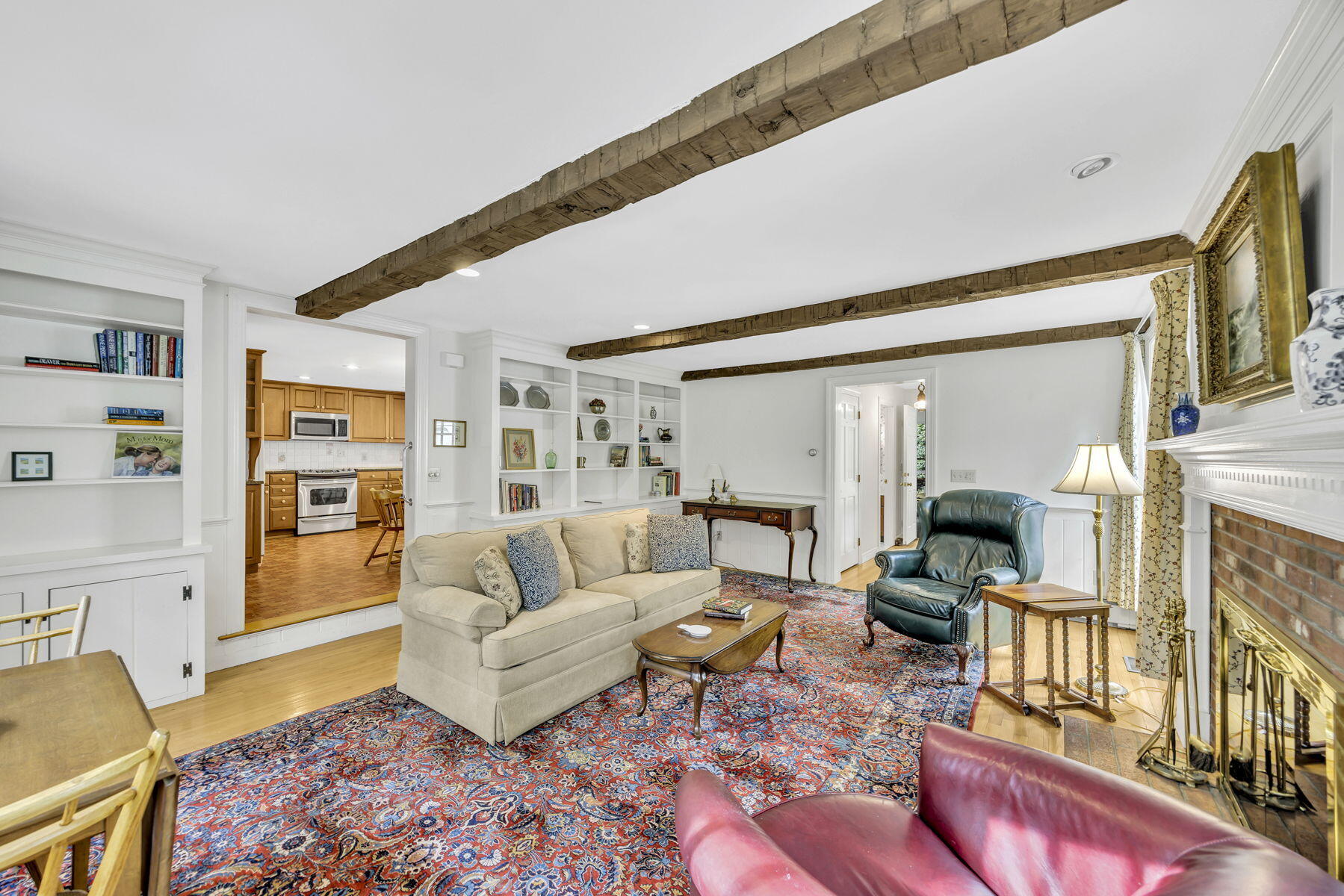 473 Davisville Road East Falmouth, MA 02536 - Photo 11 of 41 a living room with furniture wooden floor and a flat screen tv