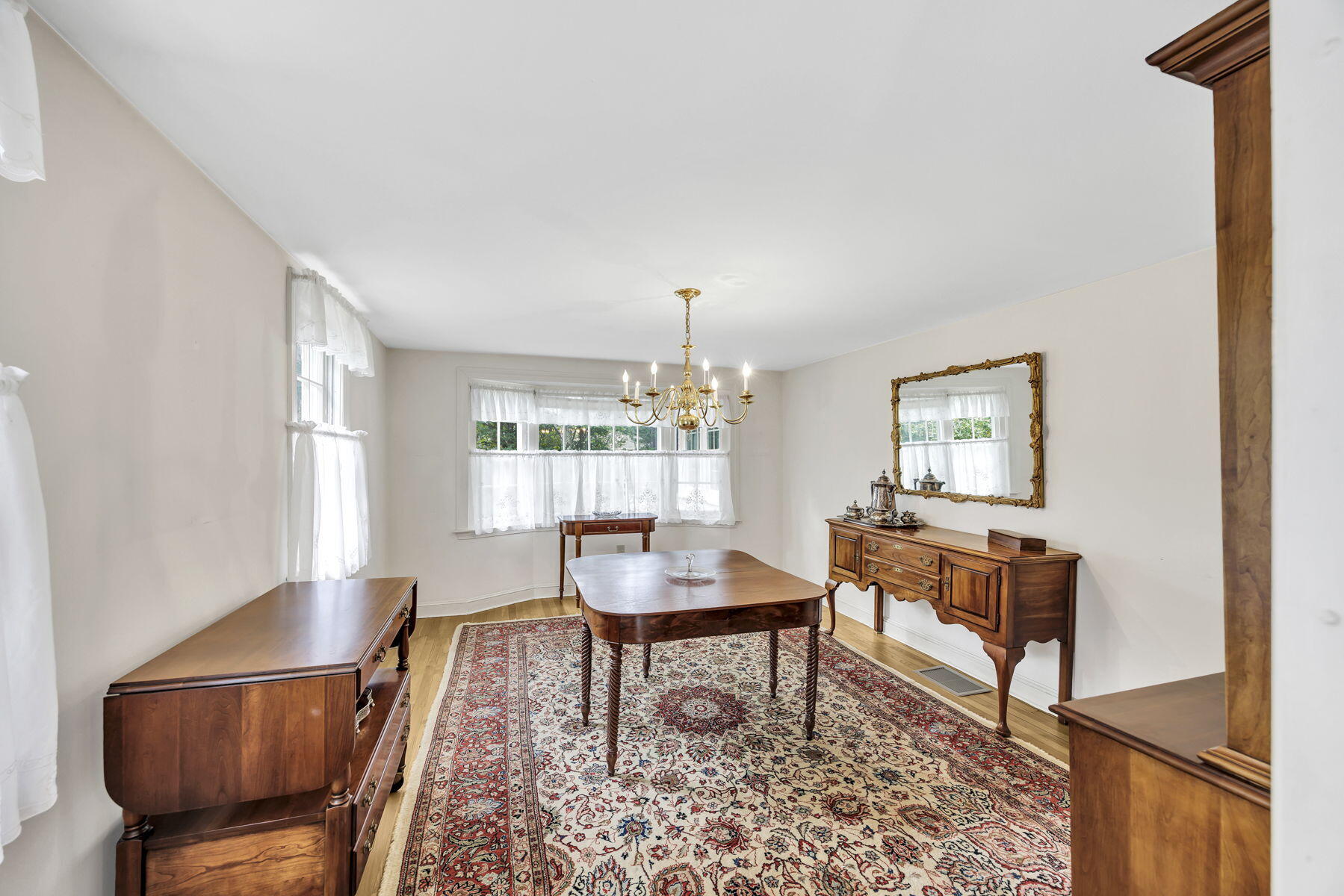 473 Davisville Road East Falmouth, MA 02536 - Photo 21 of 41 a living room with furniture and a window
