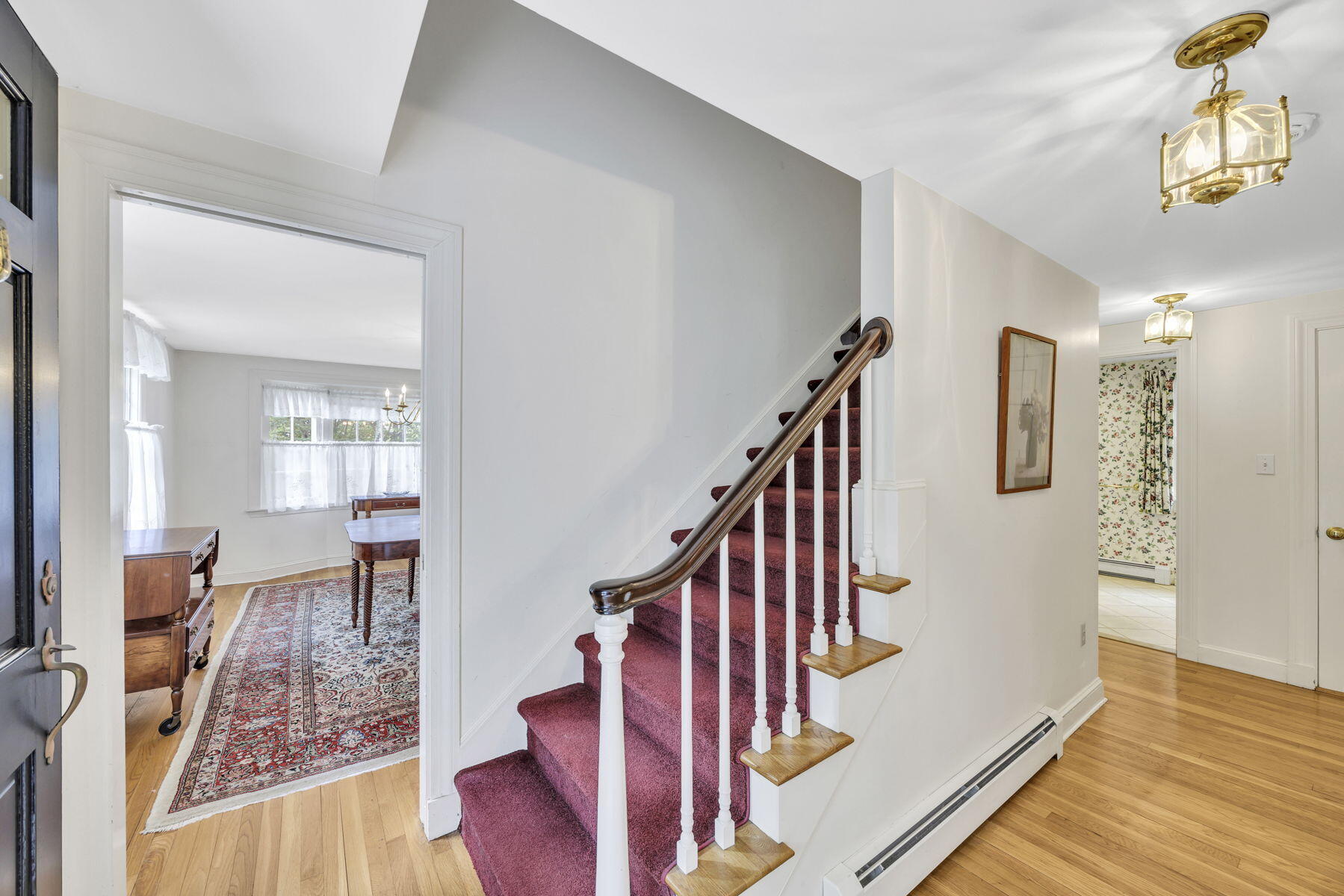 473 Davisville Road East Falmouth, MA 02536 - Photo 23 of 41 a view of entryway and hall with wooden floor