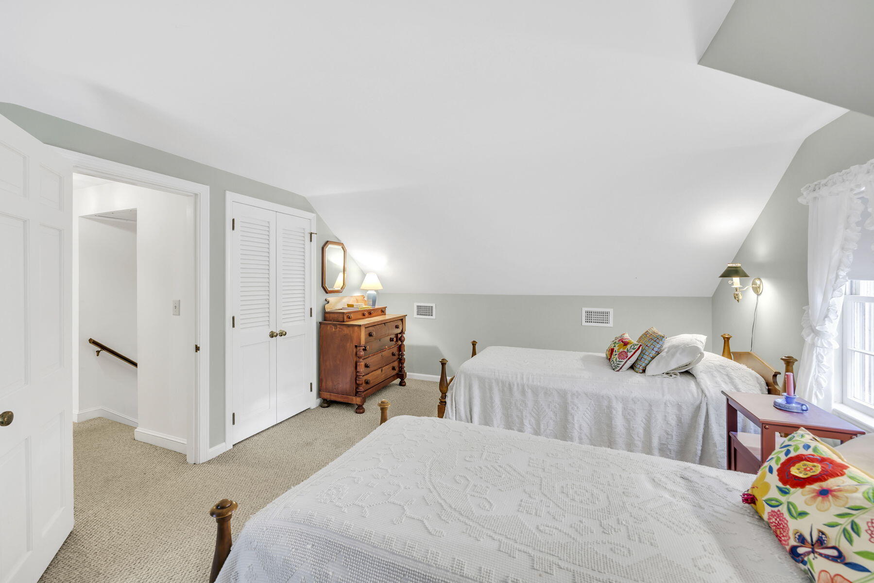473 Davisville Road East Falmouth, MA 02536 - Photo 26 of 41 a bedroom with two beds and a lamp