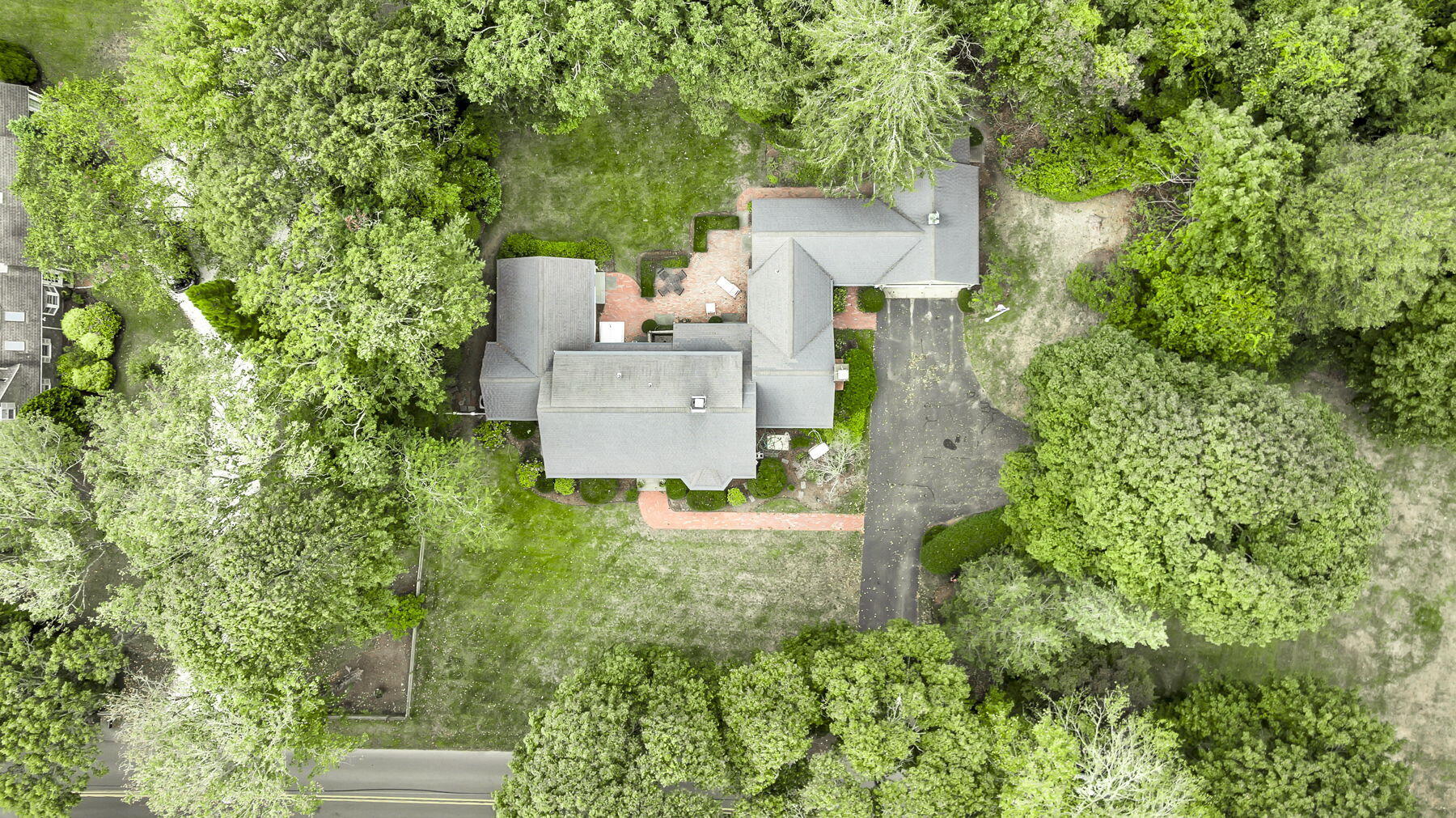 473 Davisville Road East Falmouth, MA 02536 - Photo 37 of 41 a view of a house with a yard and plants