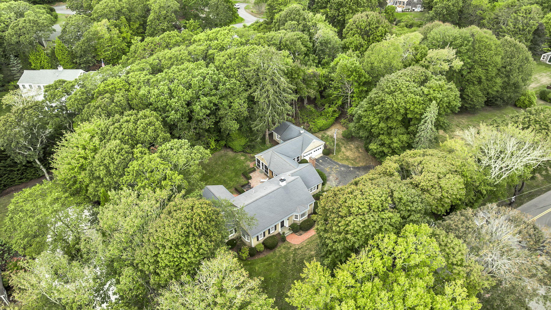 473 Davisville Road East Falmouth, MA 02536 - Photo 39 of 41 an aerial view of residential house with outdoor space and trees all around