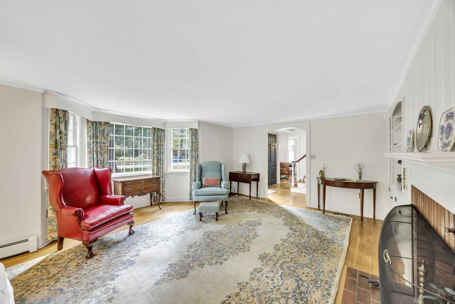 473 Davisville Road East Falmouth, MA 02536 - Photo 6 of 41 a living room with furniture and a wooden floor