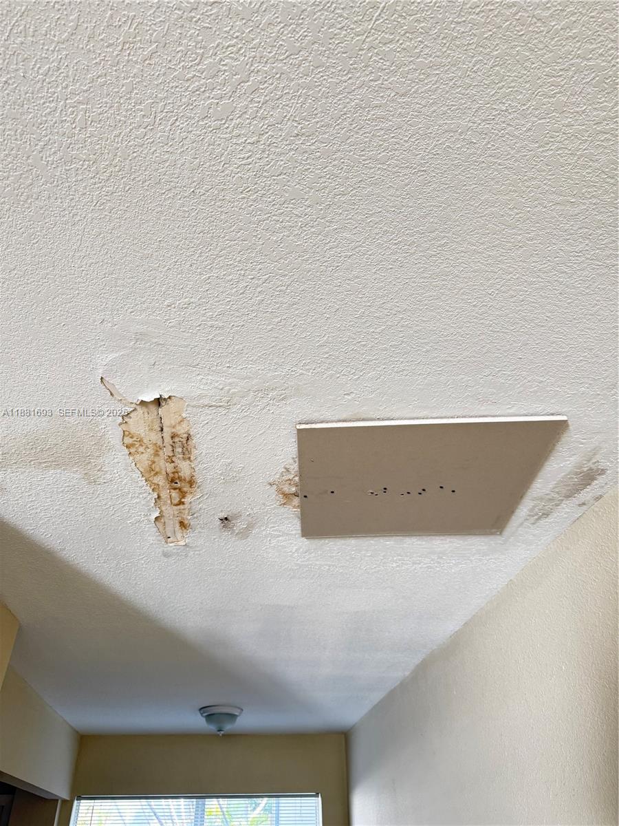 4625 Northwest 9th Drive, Unit 4625 Plantation, FL 33317 - Photo 13 of 26 a bathroom with a bathtub