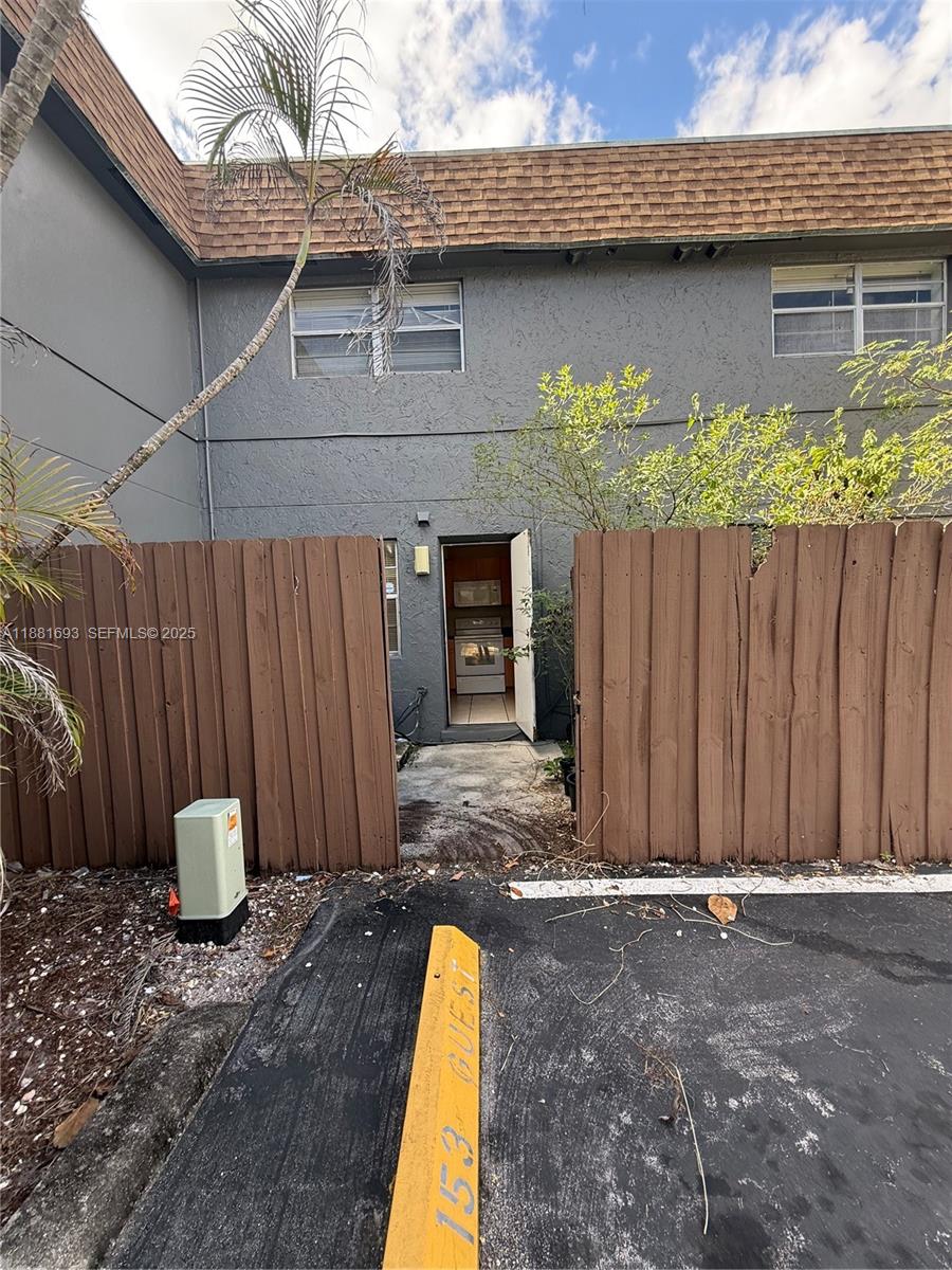 4625 Northwest 9th Drive, Unit 4625 Plantation, FL 33317 - Photo 25 of 26 a view of a backyard