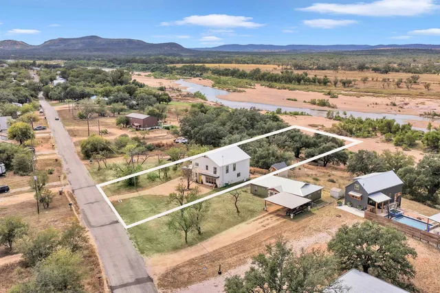 a view of an ocean and mountain