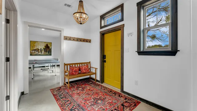 a bathroom with a toilet sink and tub