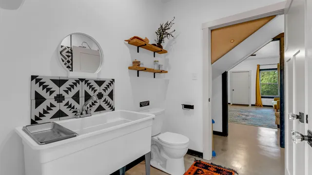 a bathroom with a shower curtain