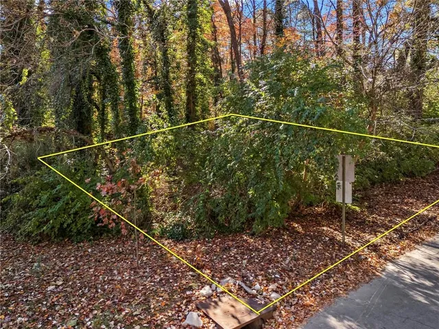 a view of a yard from a balcony