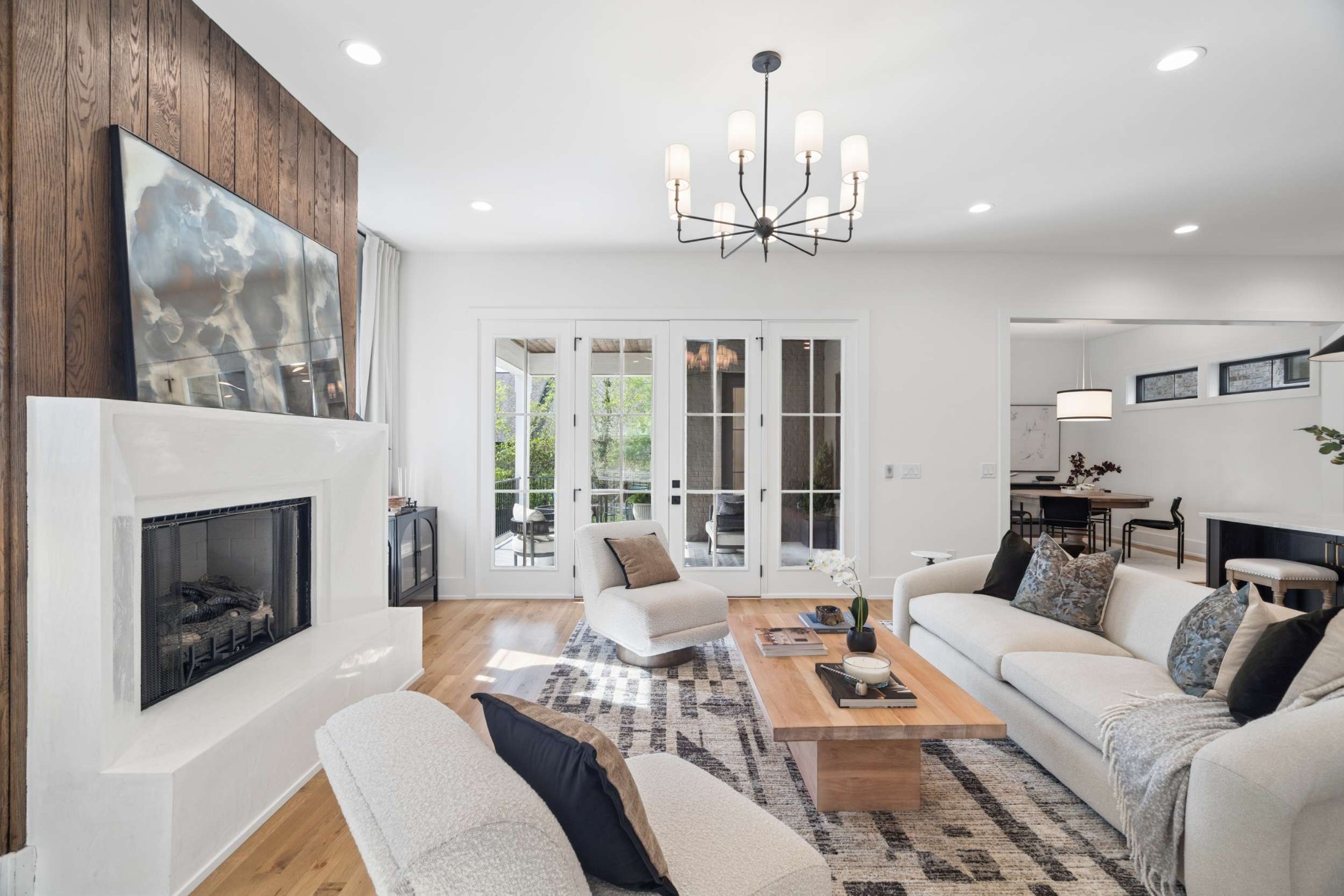 4209 B Kirtland Road Nashville, TN 37215 - Photo 11 of 69 a living room with furniture a chandelier and a fireplace