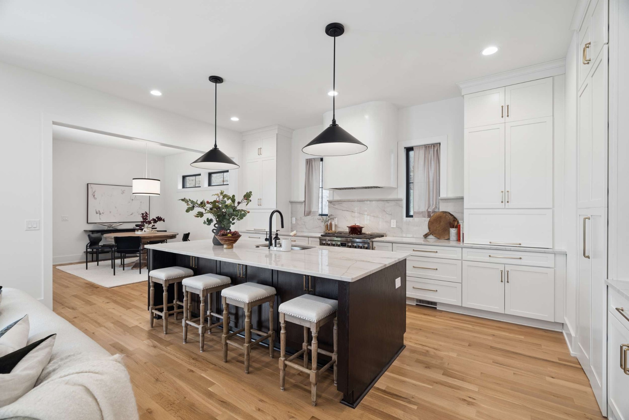 4209 B Kirtland Road Nashville, TN 37215 - Photo 12 of 69 a kitchen with kitchen island granite countertop a sink a counter space dining table and chairs