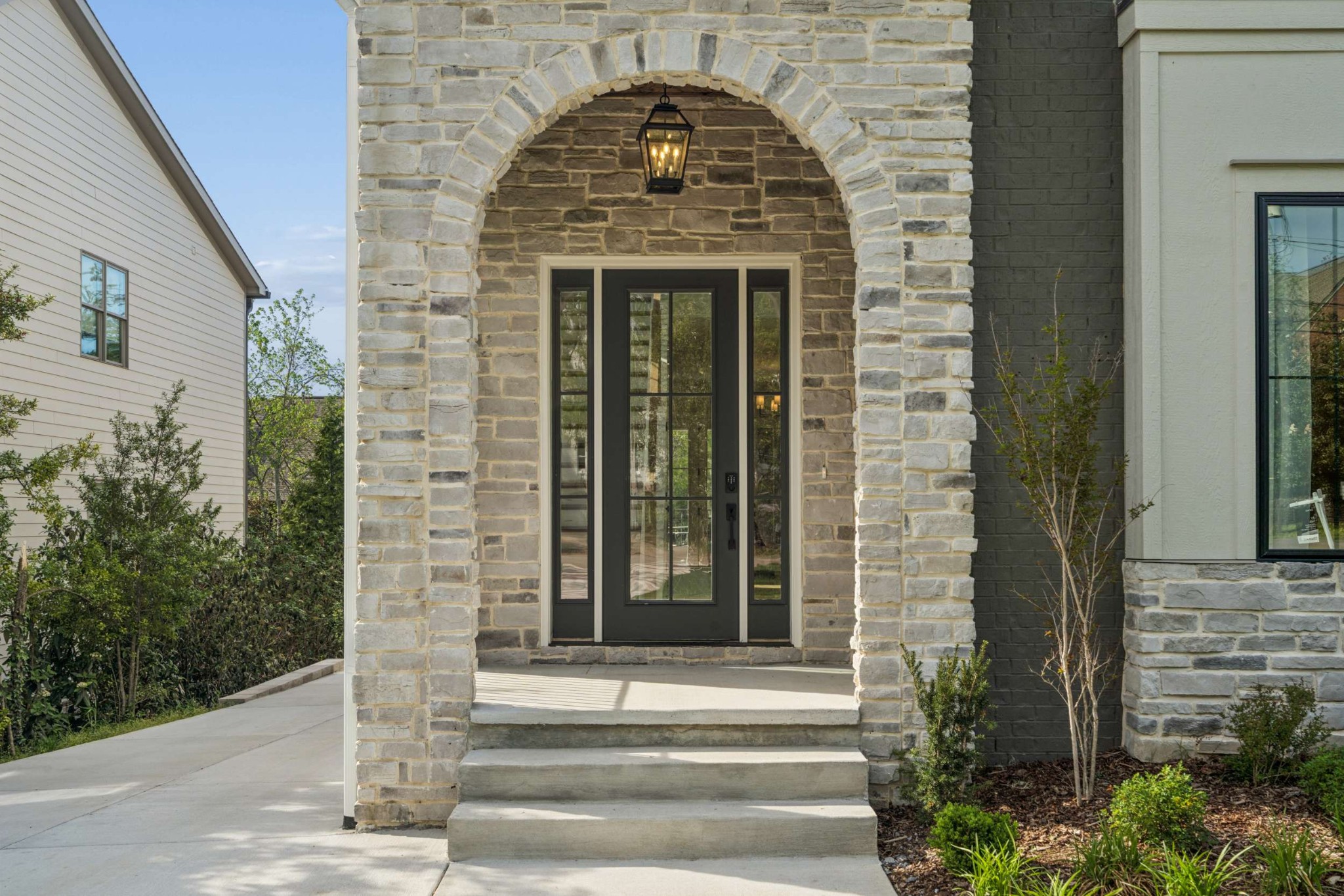 4209 B Kirtland Road Nashville, TN 37215 - Photo 2 of 69 a front view of a house with a garden