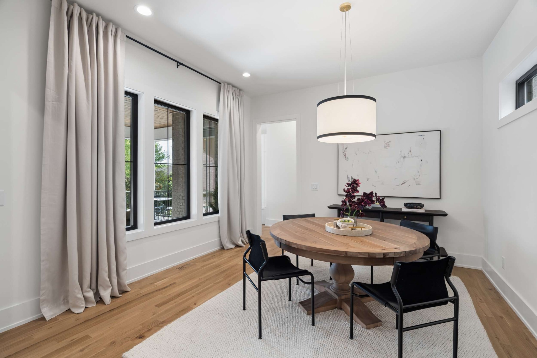 4209 B Kirtland Road Nashville, TN 37215 - Photo 22 of 69 a view of a dining room with furniture and wooden floor