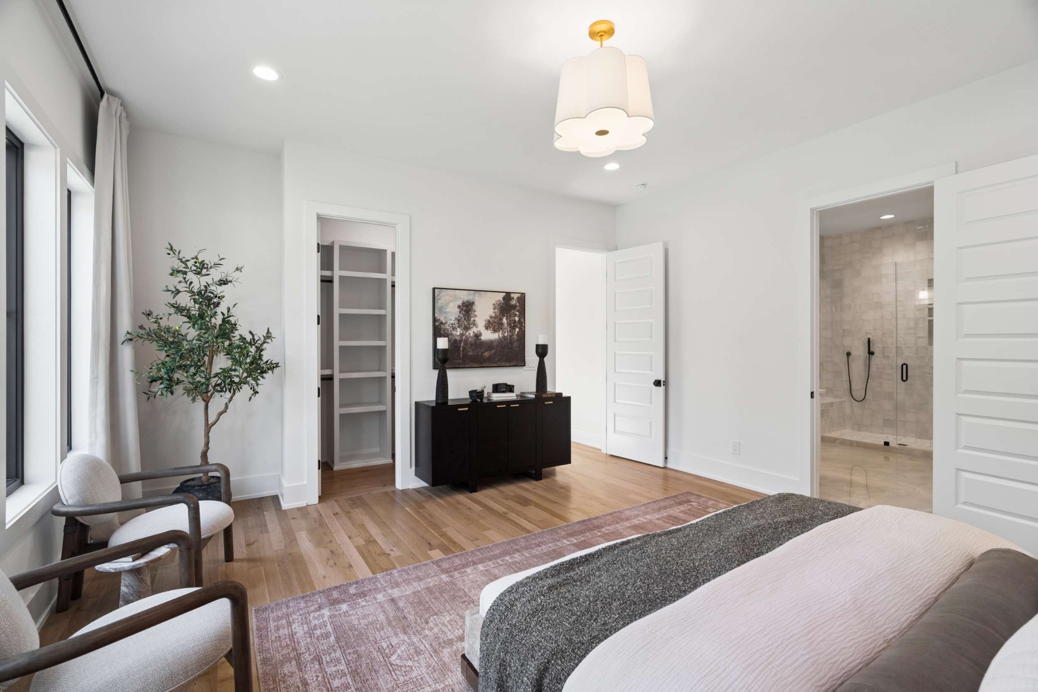 4209 B Kirtland Road Nashville, TN 37215 - Photo 26 of 69 a bedroom with a bed and a chandelier