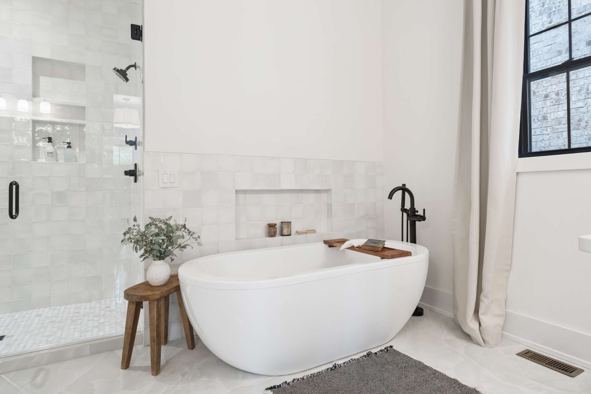 4209 B Kirtland Road Nashville, TN 37215 - Photo 30 of 69 a white bath tub sitting in a bathroom