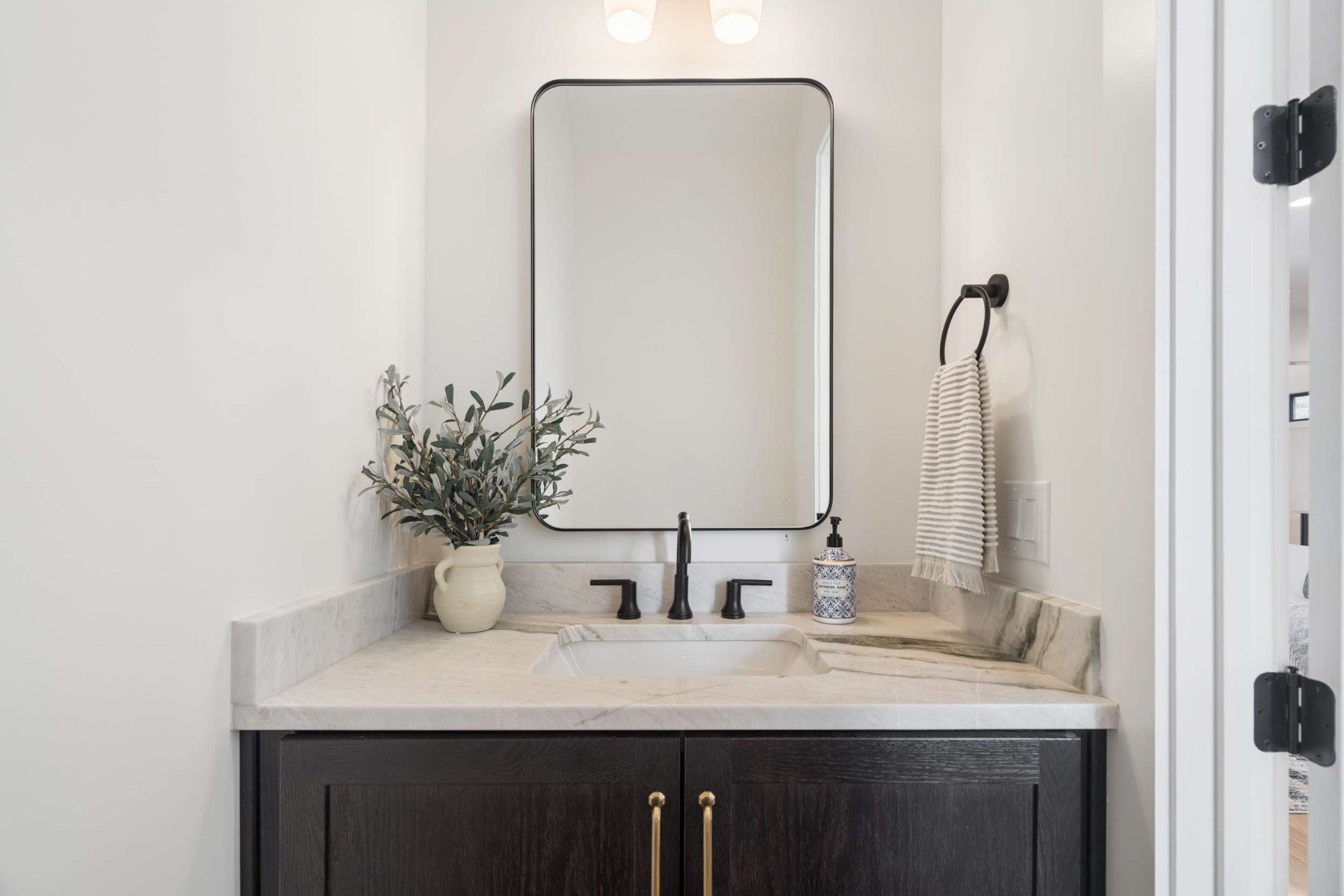 4209 B Kirtland Road Nashville, TN 37215 - Photo 32 of 69 a bathroom with a sink and a mirror
