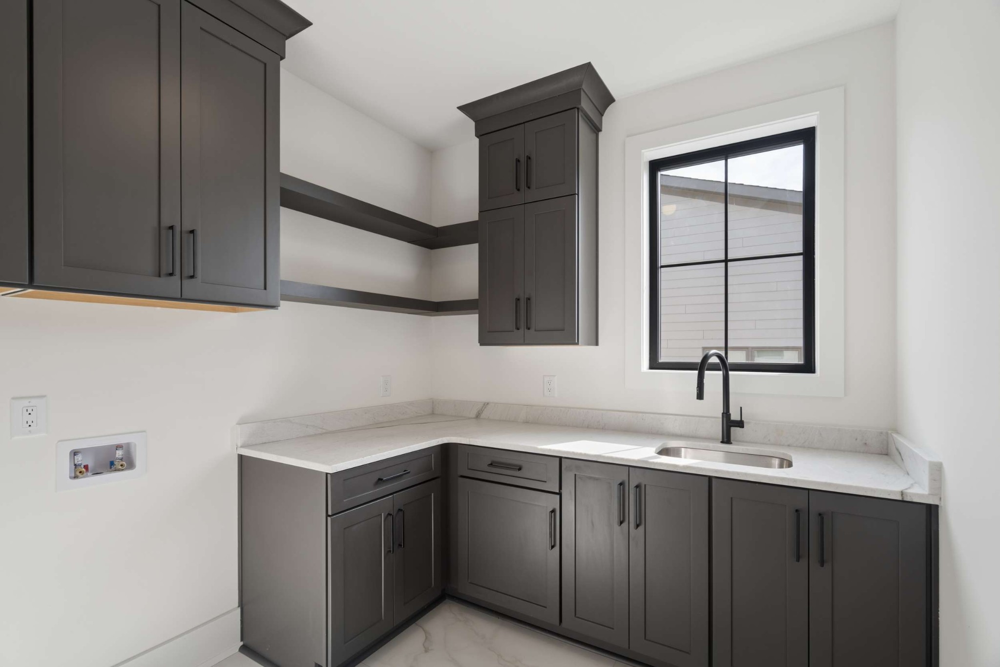 4209 B Kirtland Road Nashville, TN 37215 - Photo 42 of 69 a kitchen with a sink and cabinets
