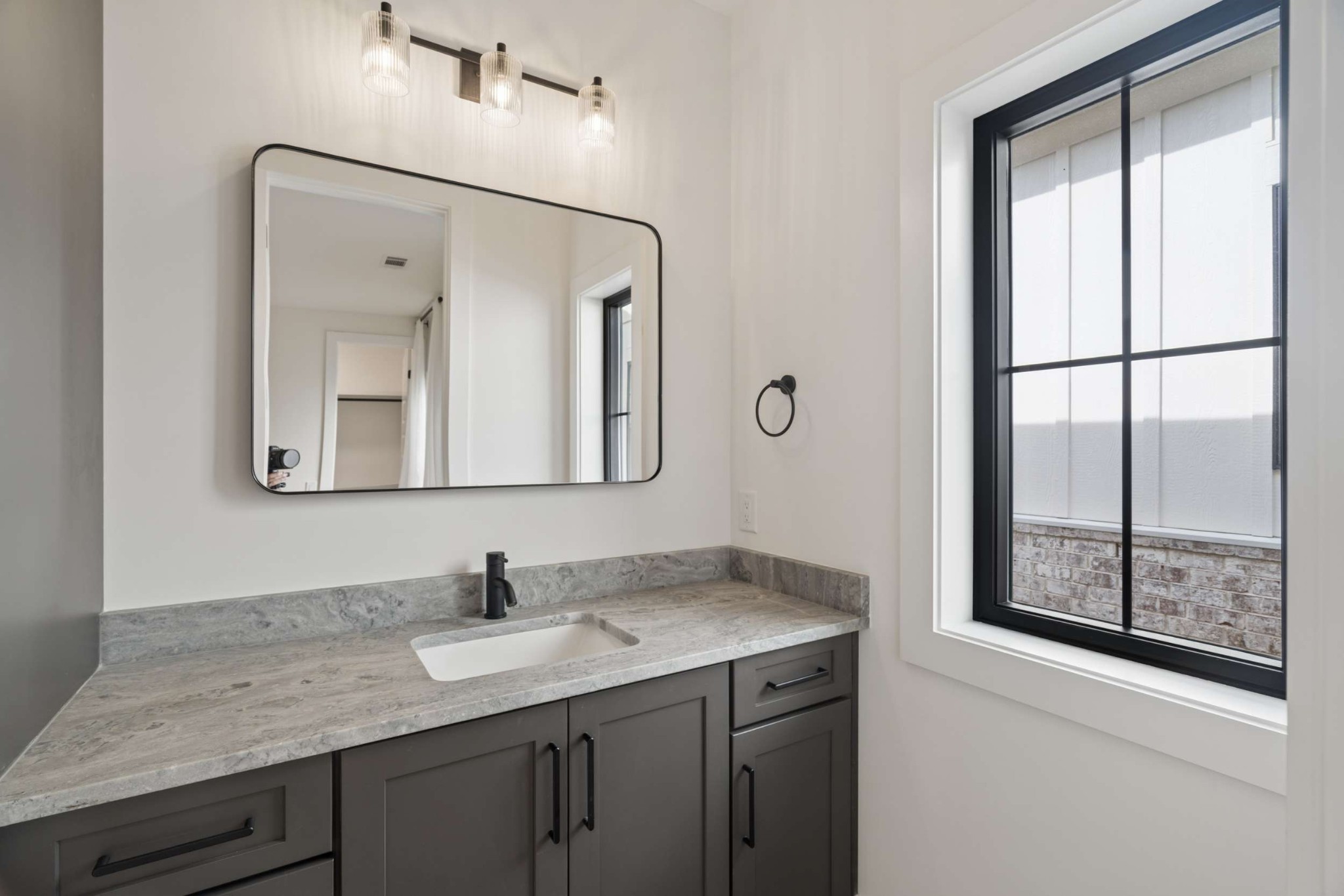 4209 B Kirtland Road Nashville, TN 37215 - Photo 45 of 69 a bathroom with a granite countertop sink mirror and