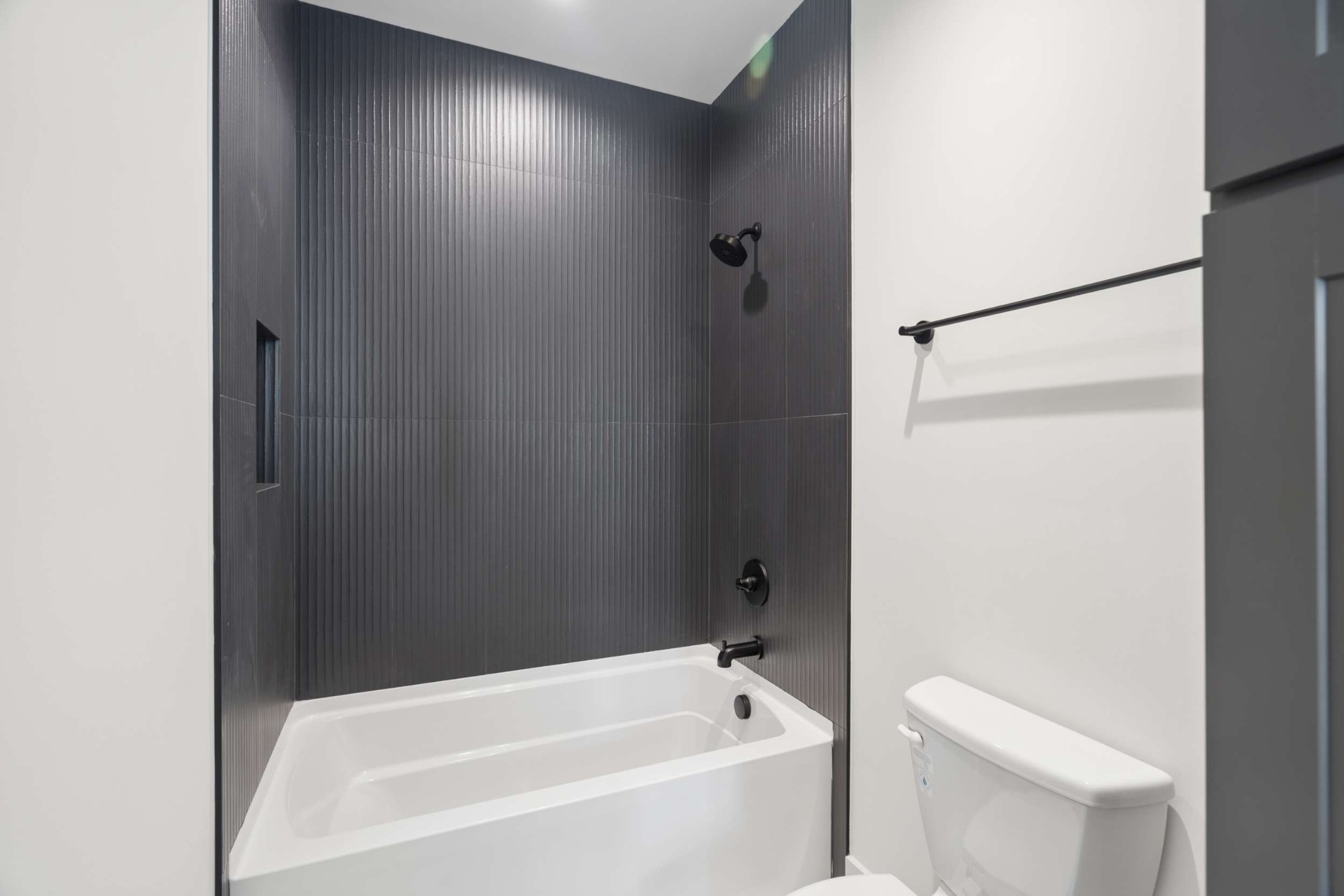 4209 B Kirtland Road Nashville, TN 37215 - Photo 46 of 69 a bathroom with a bathtub and a toilet