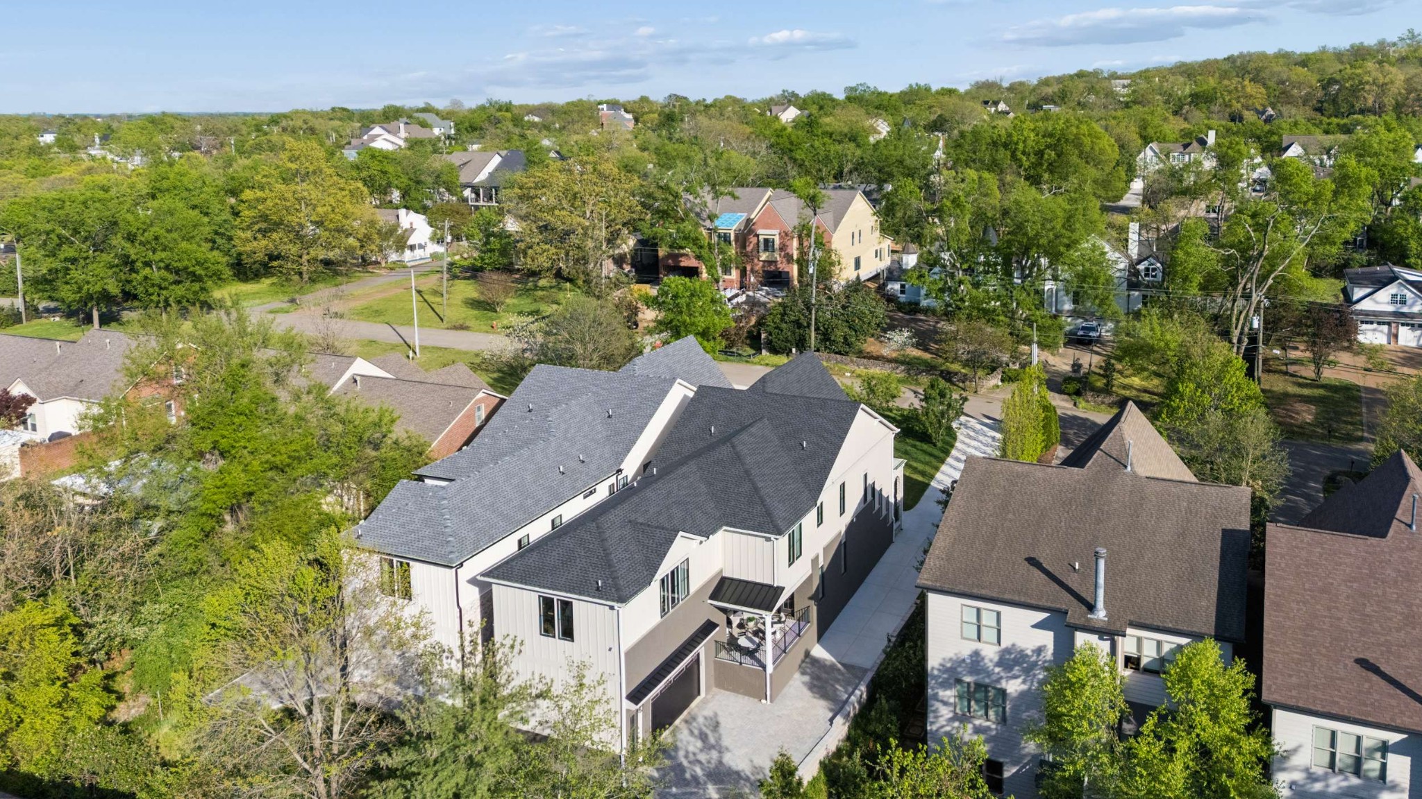 4209 B Kirtland Road Nashville, TN 37215 - Photo 58 of 69 an aerial view of a house with a yard and lake view