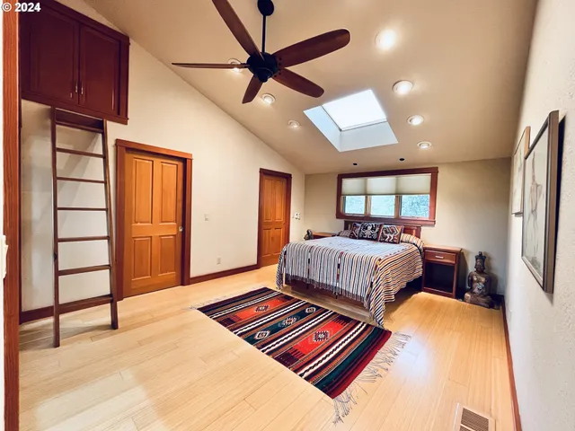 a bathroom with a toilet and shower
